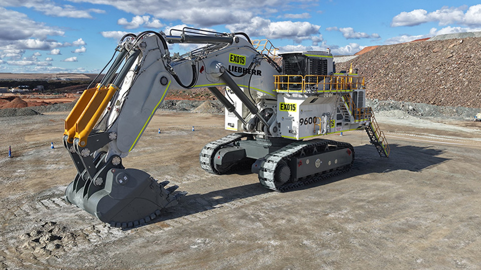 Liebherr R 9600 mining excavator in Northern Star livery at the Super Pit, showing the LIEBHERR boom decal, the 9600 badge on the machine house and the EX015 fleet number